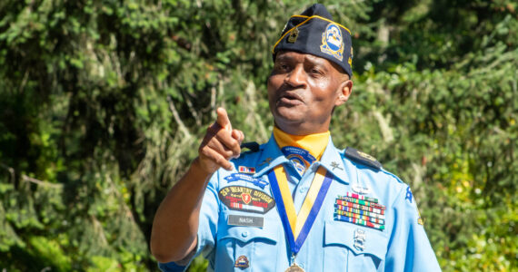 Alex Bruell photo
Veteran Darrel Nash, a board member of the Buffalo Soldier Museum in Tacoma, regales the audience with stories of Buffalo Soldier Benjamin Glover.