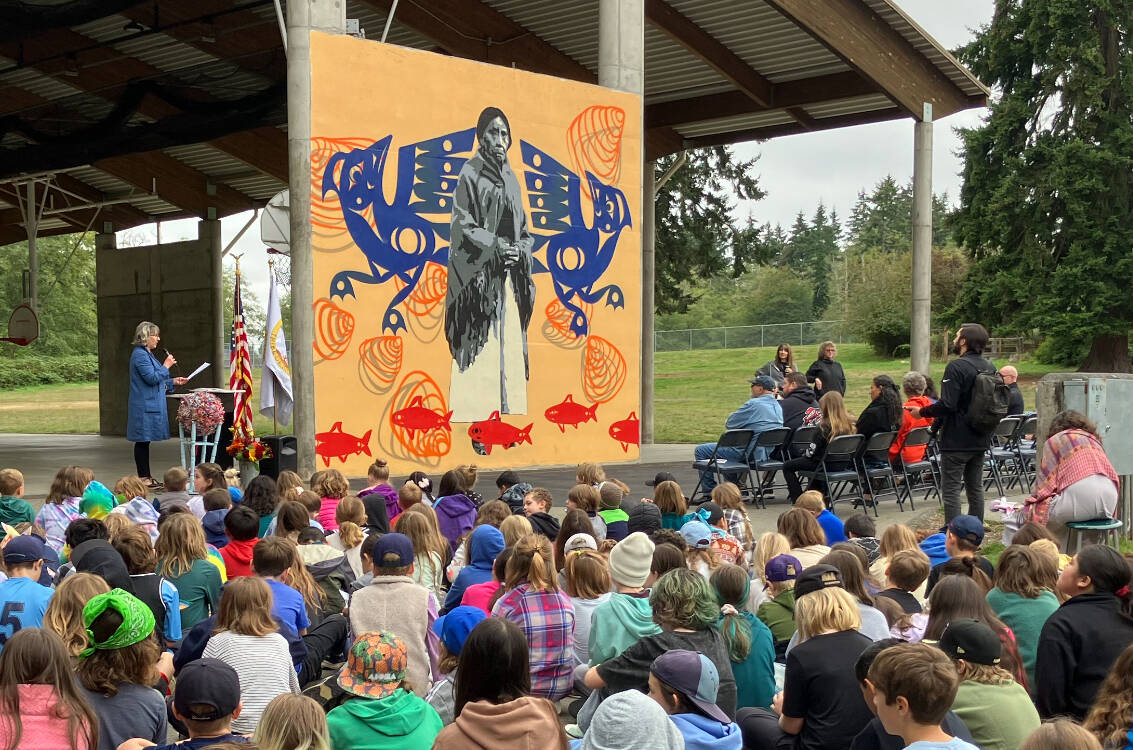 Chautauqua Elementary School students looked up and listened as a mural of Lucy Slagham Gerand was unveiled on the school’s playground. (Elizabeth Shepherd photo)