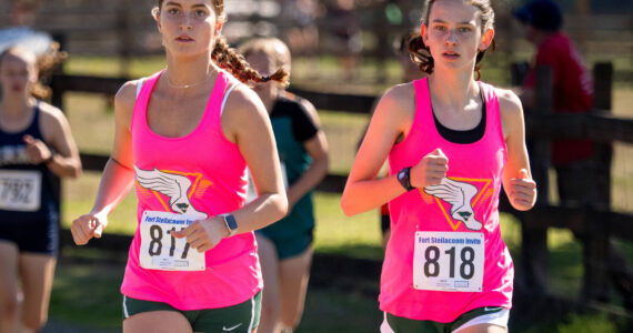 Co-captains Cece Guenther and Emily Harrington run at Fort Steilacoom, WA on Saturday, September 21. (John Decker photo)