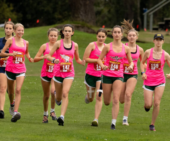 The girls of the Vashon High School Cross Country team kick off their race at Camas Prairie Golf Park in Port Townsend on Tuesday, September 17. (John Decker photo)