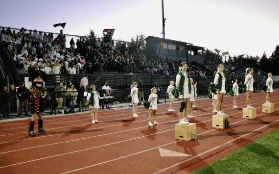 Aspen Anderson photo
The Vashon High School Cheer team pumps up the energy during the football team's home game against Sound Christian Academy on Friday, September 27.