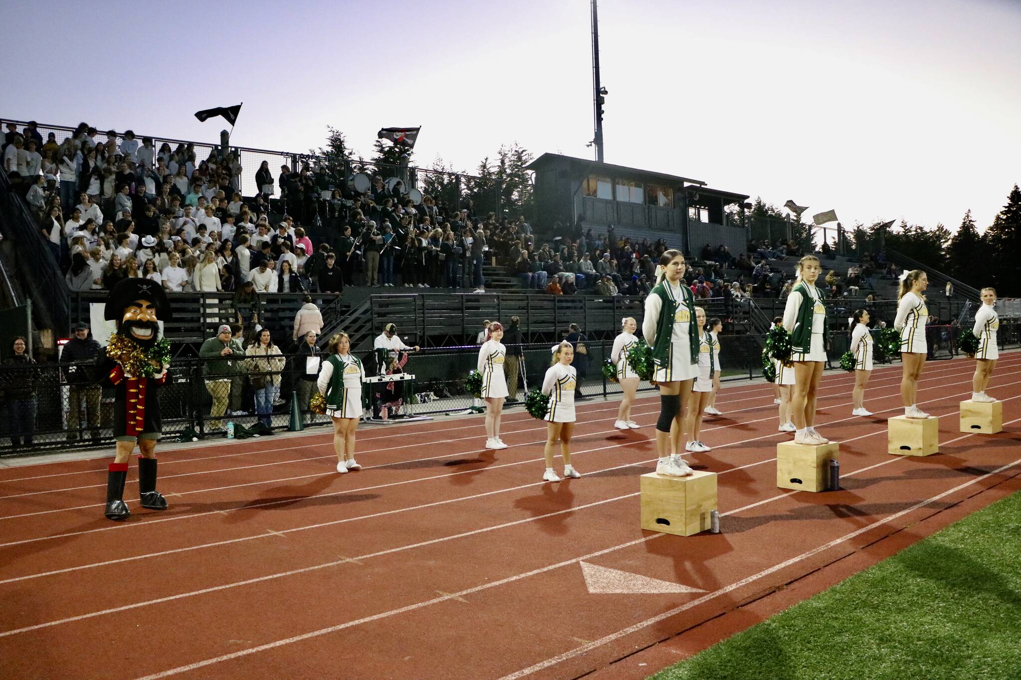 Aspen Anderson photo
The Vashon High School Cheer team pumps up the energy during the football team’s home game against Sound Christian Academy on Friday, September 27.