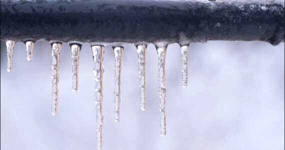 The bulge in this pipe means the water has frozen, expanding to the point that it has burst the pipe. The result has been a leak that could flood a house.