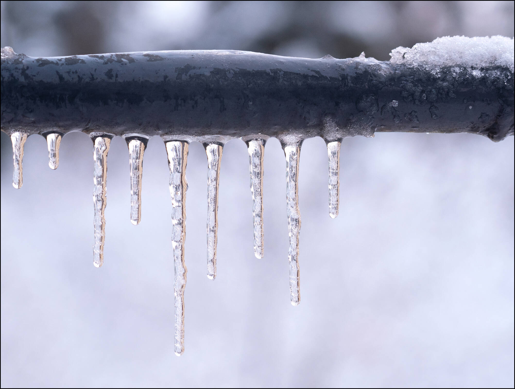 The bulge in this pipe means the water has frozen, expanding to the point that it has burst the pipe. The result has been a leak that could flood the house. (Courtesy photo)