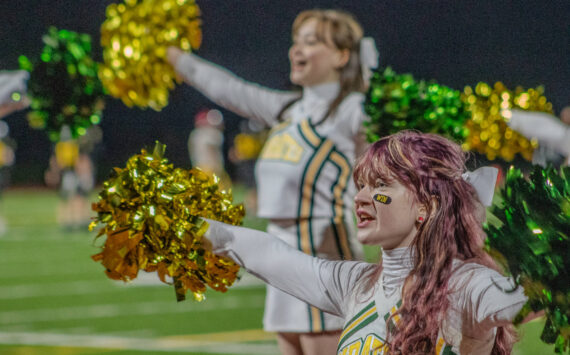 Alex Bruell photo
Cheerleaders pump up the crowd.