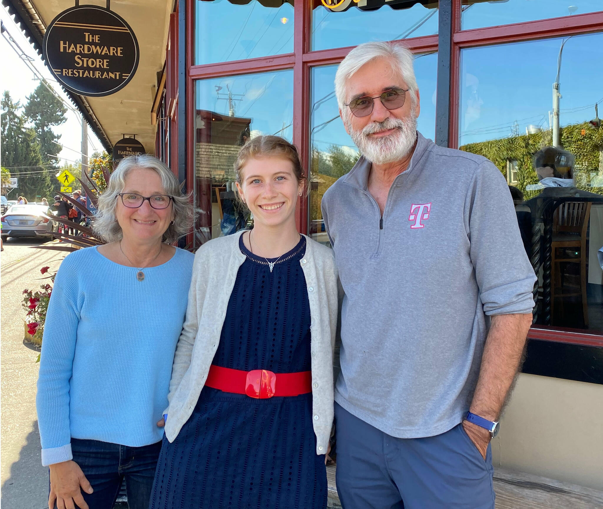 From right to left: Peter Serko, Bridget Simmons and Julie Jaffe stand for a picture outside The Hardware Store Restaurant. The three were each instrumental in the creation of an islander’s audiobook project concerning the Civil War. (Courtesy photo)