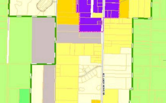 This image shows zoning areas in Vashon, zoomed in on Vashon Rural Town. Light and dark green: "Rural Area." Dark purple: "Community Business." Gray: "Industrial." Shades of white to yellow, orange and red: "Residential" (the more red, the higher the allowed density). Olive: "Agricultural." Light purple: "Neighborhood Business." (For more detail, visit gismaps.kingcounty.gov/iMap.)