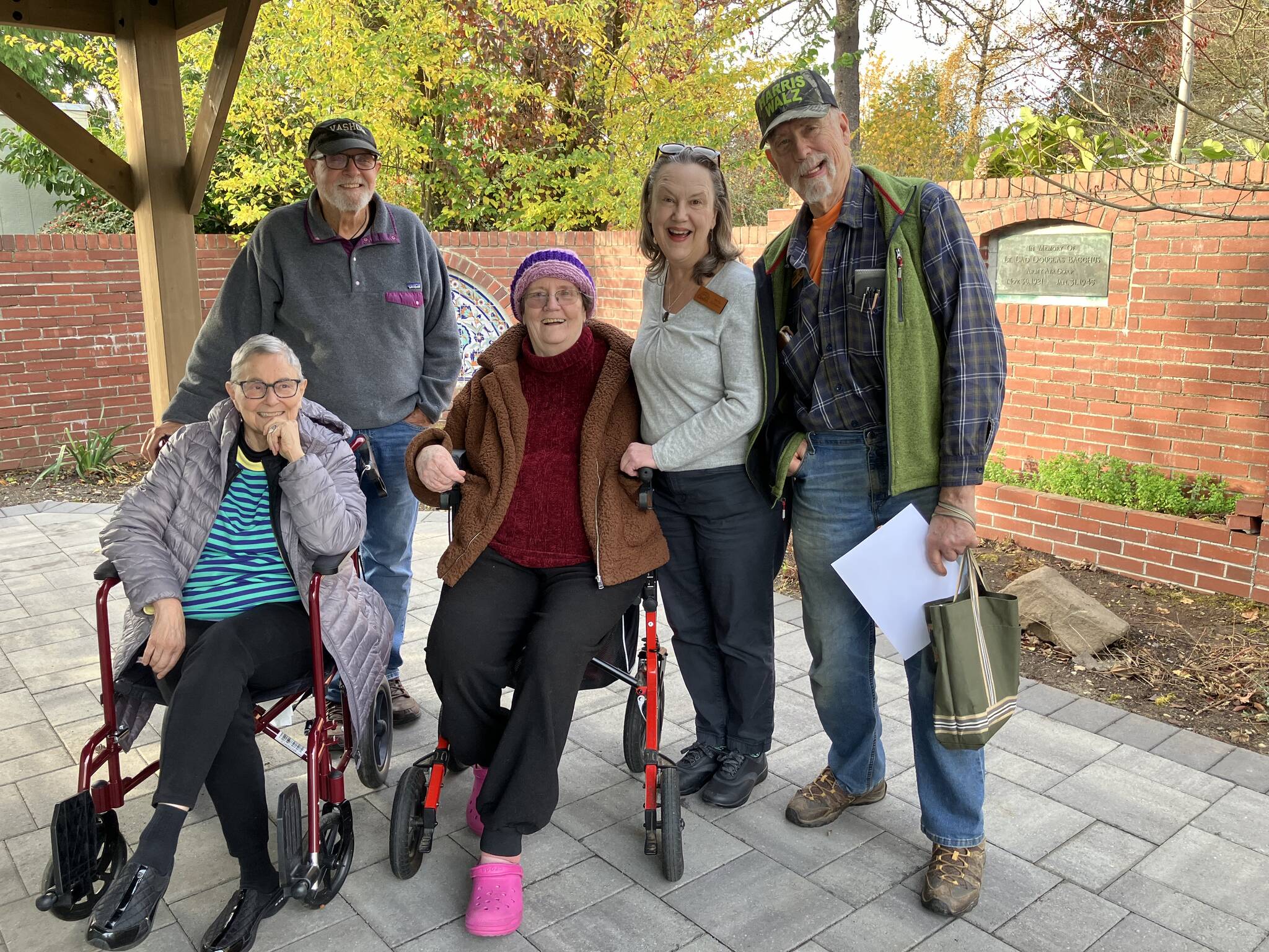 (Left to right) Wanda Fullner, Bruce Haulman, Lee Green, Maria Glanz, and Bill Swartz, in Vashon Senior Center’s World War II Memorial Garden on Nov. 8. (Elizabeth Shepherd photo)