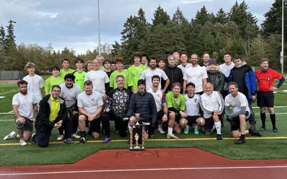 Cara Briskman photo
The men and youth of this year's Ryan Krug Memorial Cup are pictured after the end of the game.