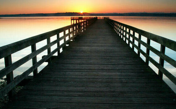 This 2006 photograph by island photographer Ray Pfortner captured the beauty of a sunrise over Tramp Harbor dock. (Ray Pfortner photo)