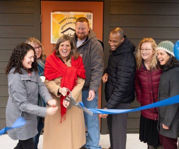 The ribbon is cut at Island Center Homes by, from left to right: Kelly Rider, director of the King County Department of Community and Human Services; Judy Tucker, owner of Form + Function Architecture; Kari Dohn Decker, interim executive director of Vashon HouseHold; Alex Crowder, CEO of Crowder Construction; Chris Lovings, community engagement lead at the Washington State Department of Commerce; Rachel Hetrick, housing stewardship manager at Vashon HouseHold; and Shelly Whitlock, property manager at Vashon HouseHold.
(John Decker photo)