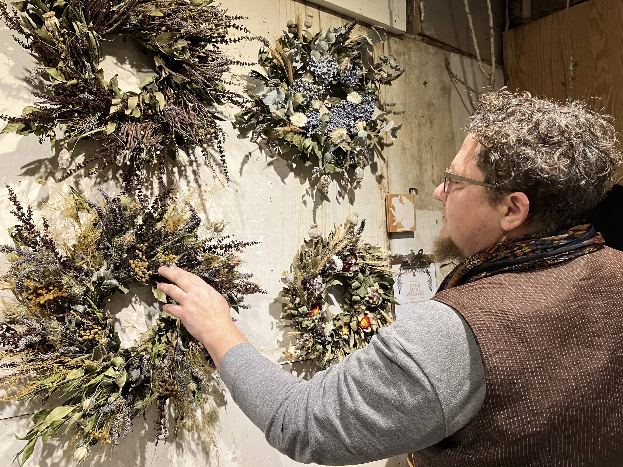 Jennifer Hawke, with her handmade wreaths. (Elizabeth Shepherd photo)