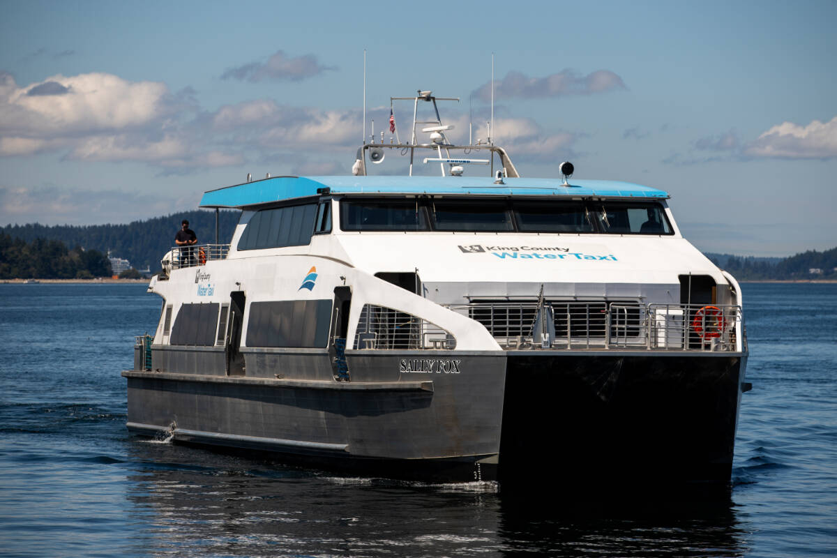 The Sally Fox water taxi arrives to ferry people to and from the annual Strawberry Festival on Vashon Island on July 17, 2021.