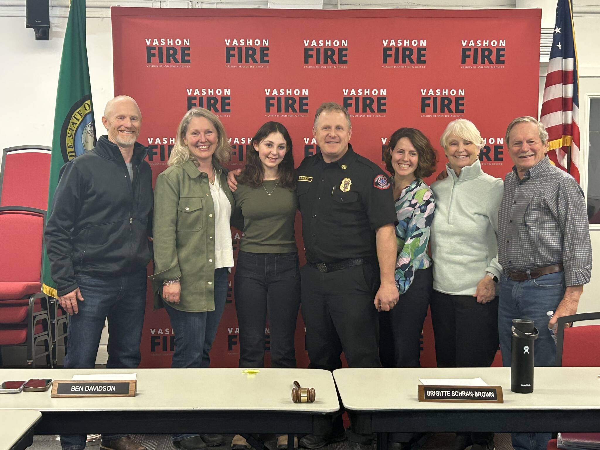 Ben Davidson was officially installed as Vashon’s Deputy Fire Chief at a ceremony on Dec. 30, with immediate family members in attendance. Left to right, Ed and Erica Davidson, Adeline Davidson, Ben and Kate Davidson, and Nancy and Dennis Davidson. (Tom Hughes photo)