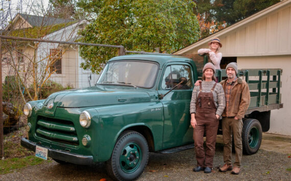 2024 Terry Donnelly Photograph. 
Lisa Hasselman, Chris Hedgpeth, and their daughter Loretta with Tashio’s truck.