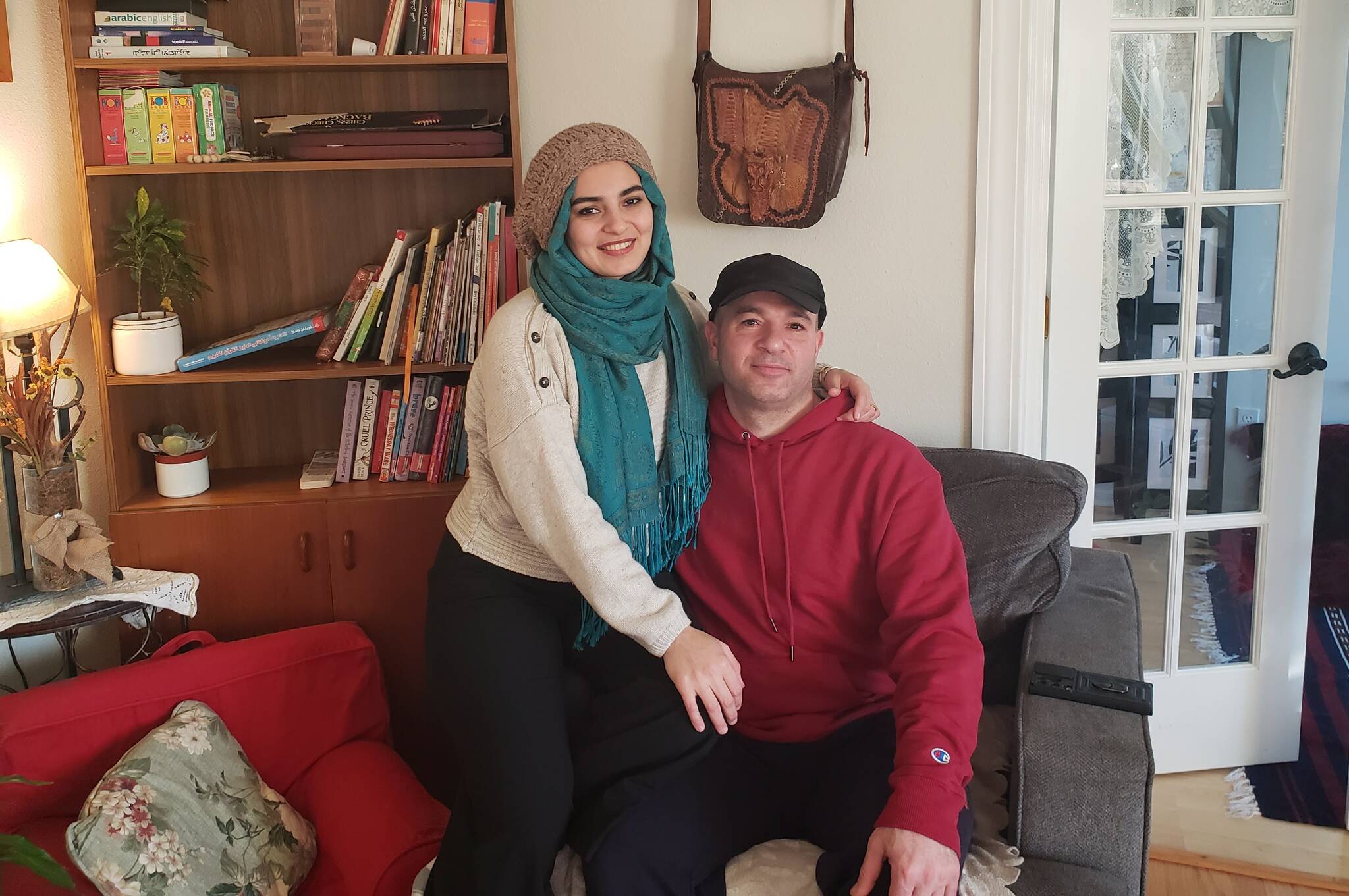 Safa Jneidi, left, and Iyad Alati are hopeful that Syria, their home, will finally become a safe place again. (Leslie Brown photo)